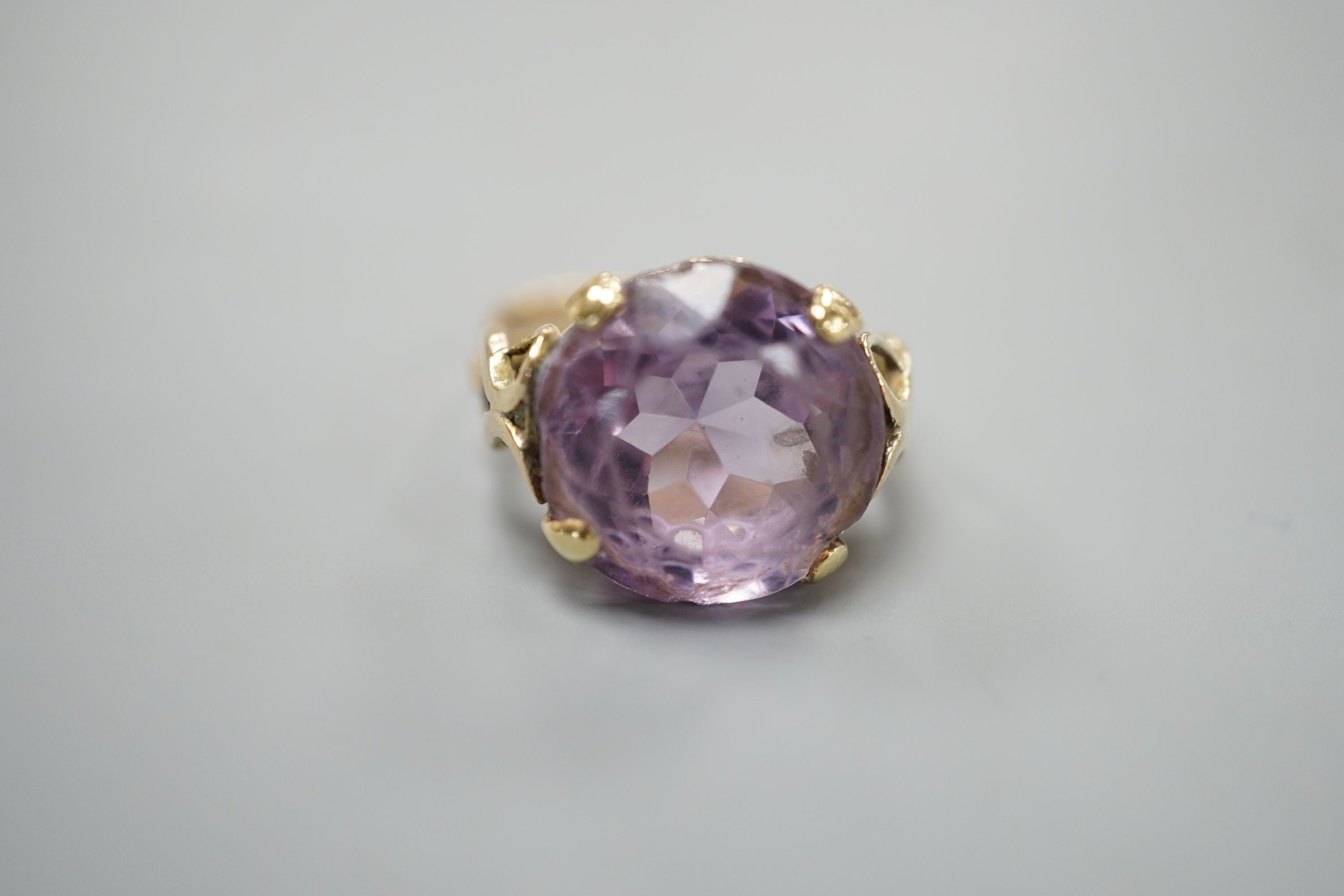 A modern 9ct gold and amethyst set dress ring, size O, gross weight 7.3 grams.